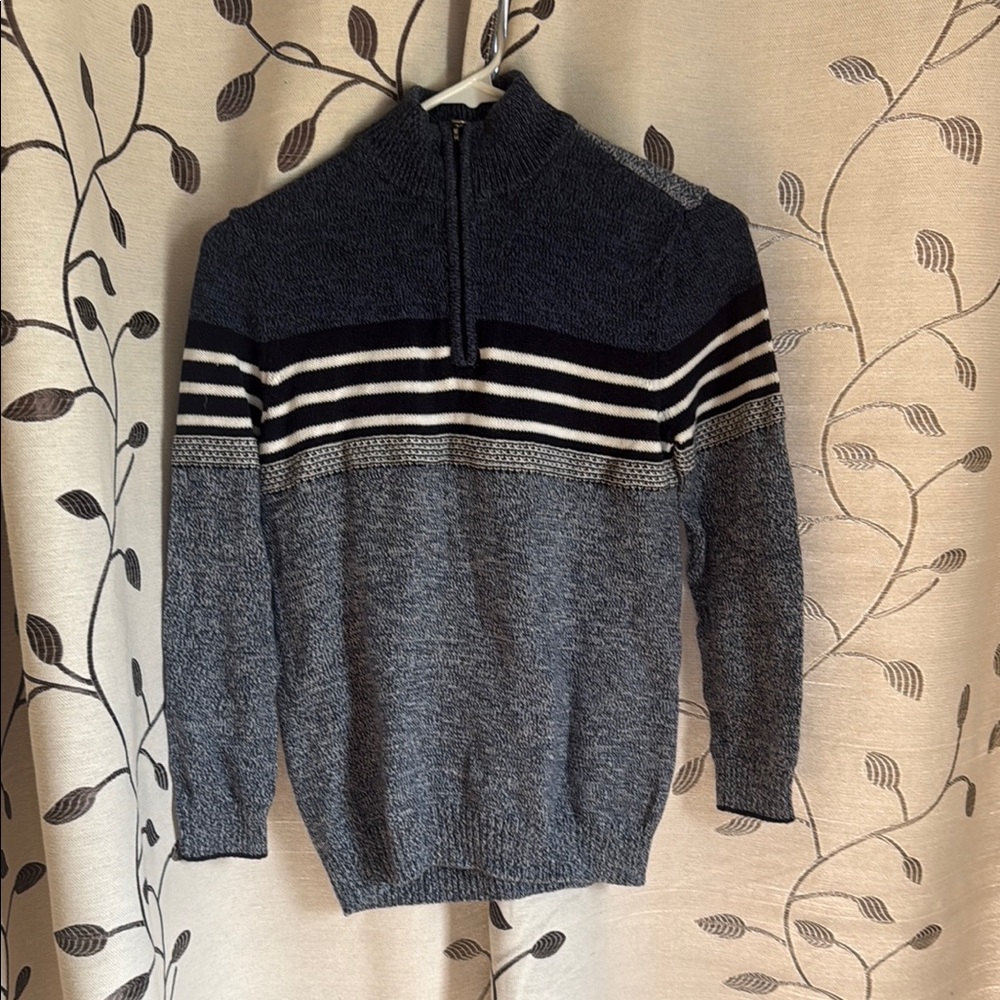 Blue and Gray Zip Up Jacket with Color Block Design.
Worn once by my boy.